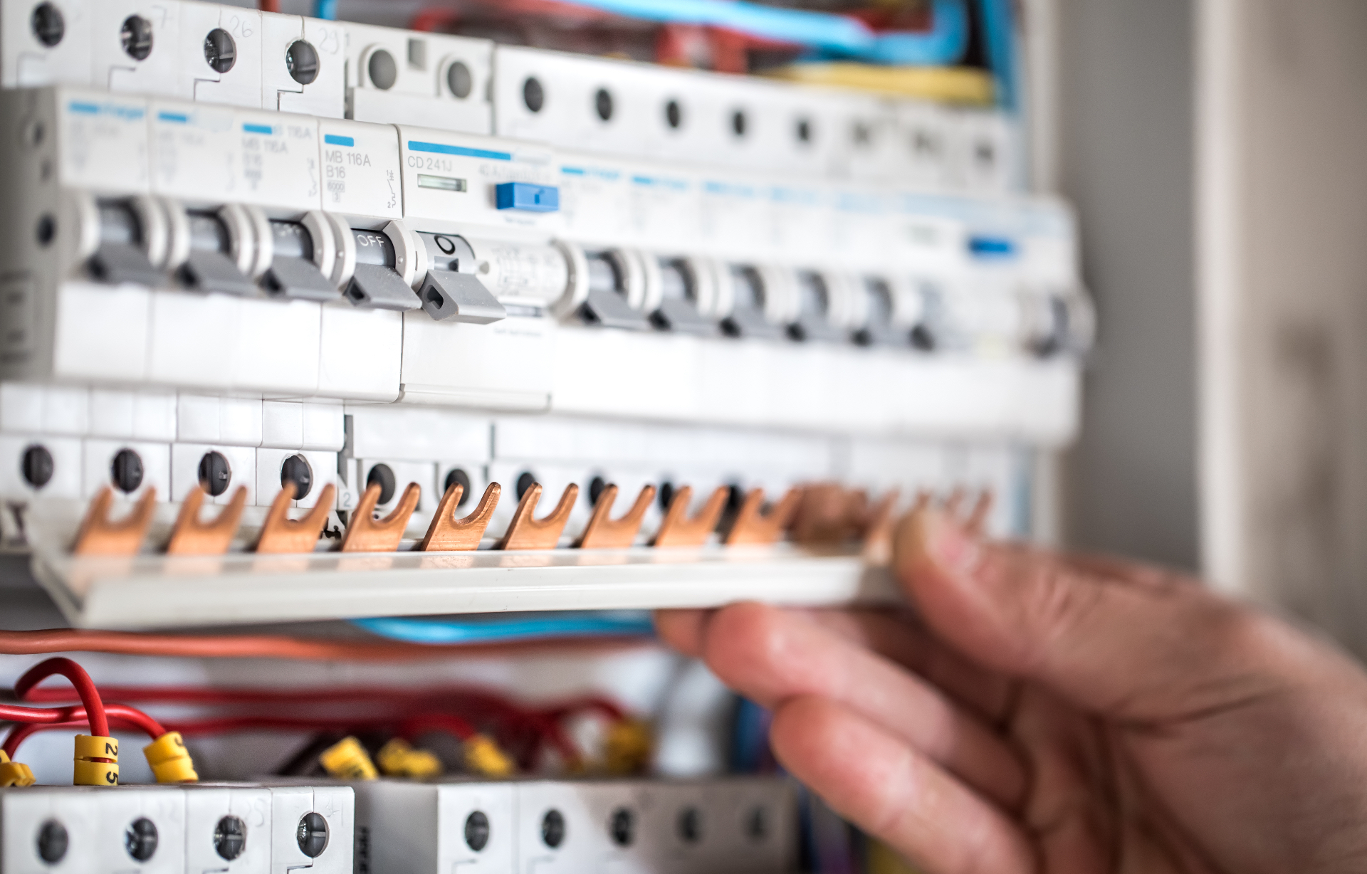 Liverpool electrician working on fuse board